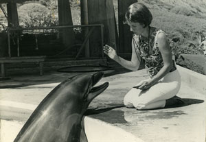 Karen Pryor cueing a dolphin at Sea Life Park in Hawaii.