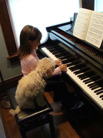 emily and winston at the piano