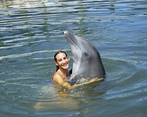 Heather posing with Aleta at the Dolphin Research Center.